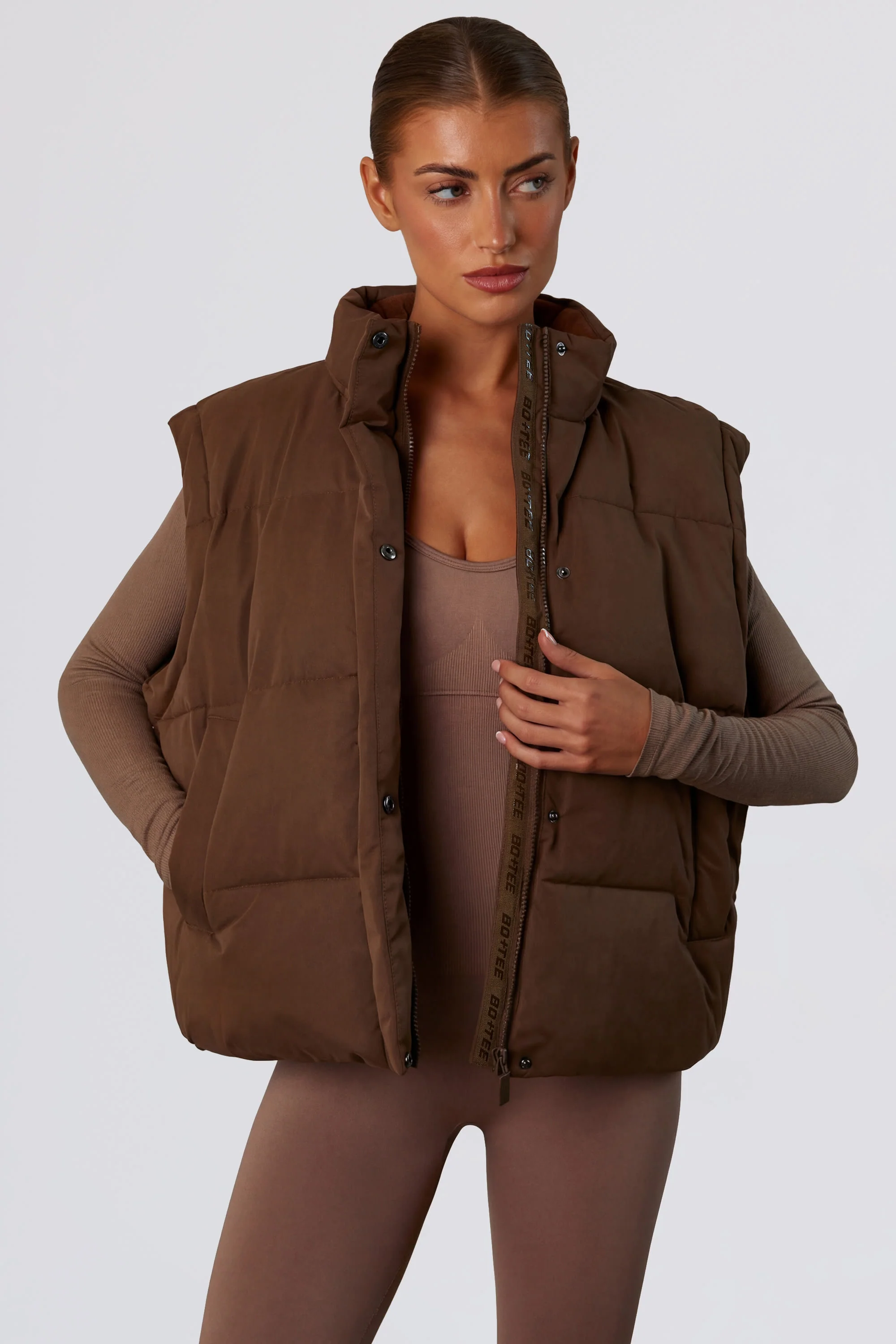 Cropped Puffer Jacket with Detachable Sleeves in Cocoa Brown - Image 9