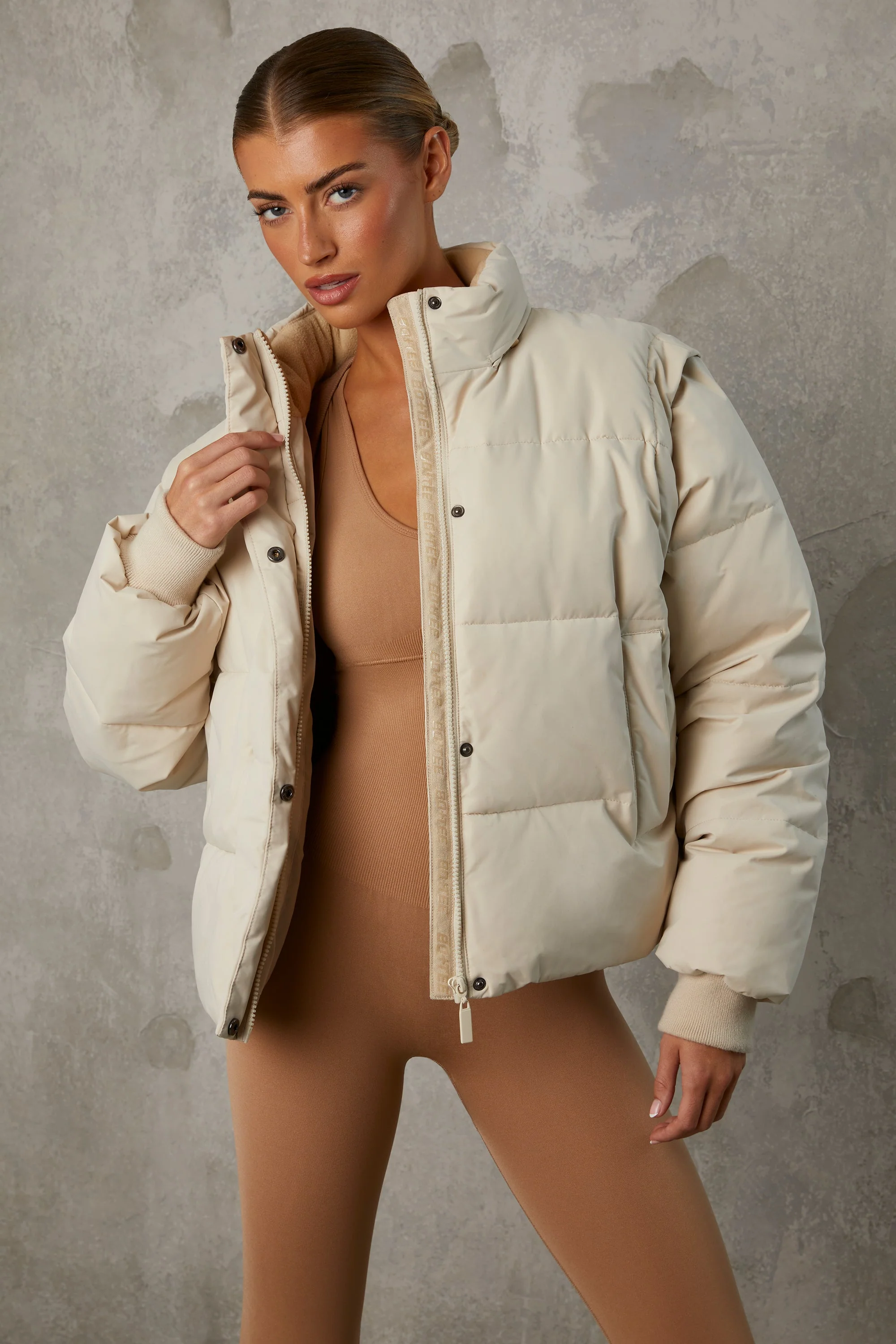 Cropped Puffer Jacket with Detachable Sleeves in Sand - Image 9