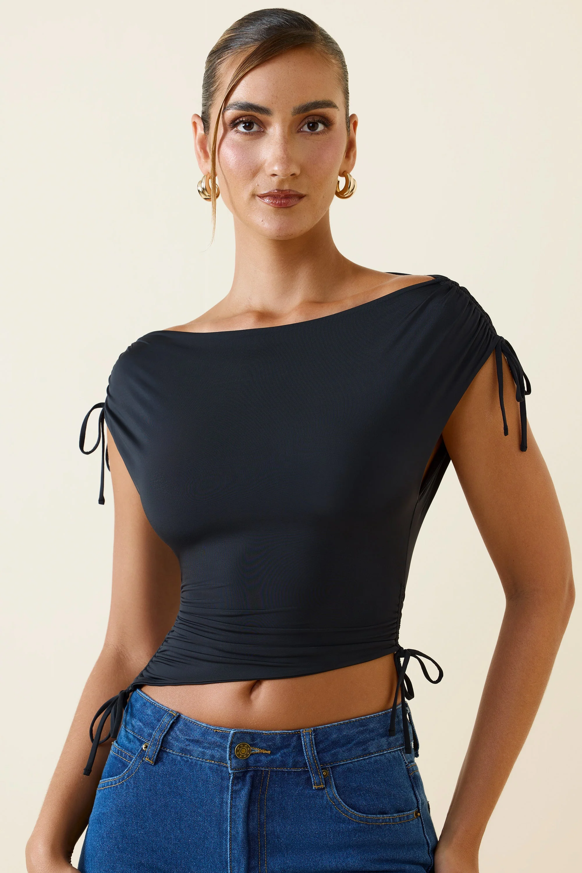 Asymmetric Ruched Cowl-Back Crop Top in Black - Image 6