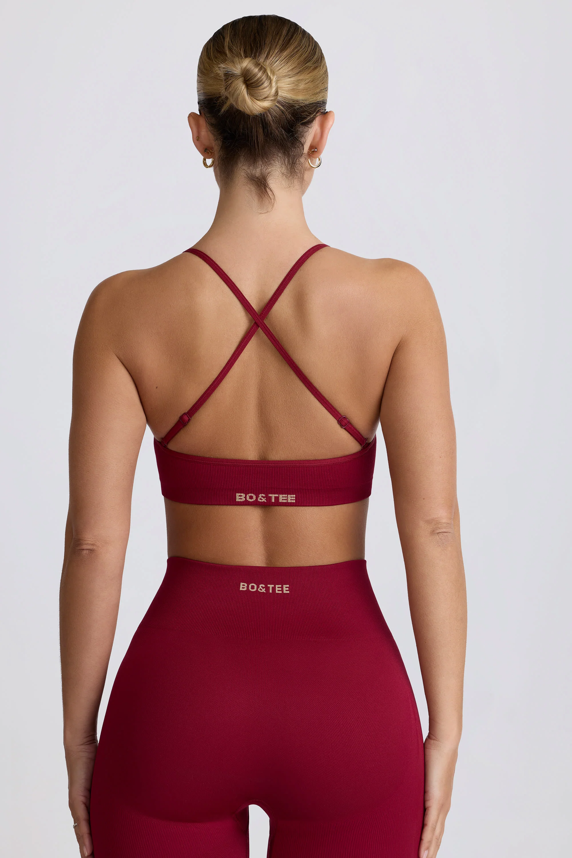Super Sculpt Seamless Cross-Back Sports Bra in Burgundy - Image 3