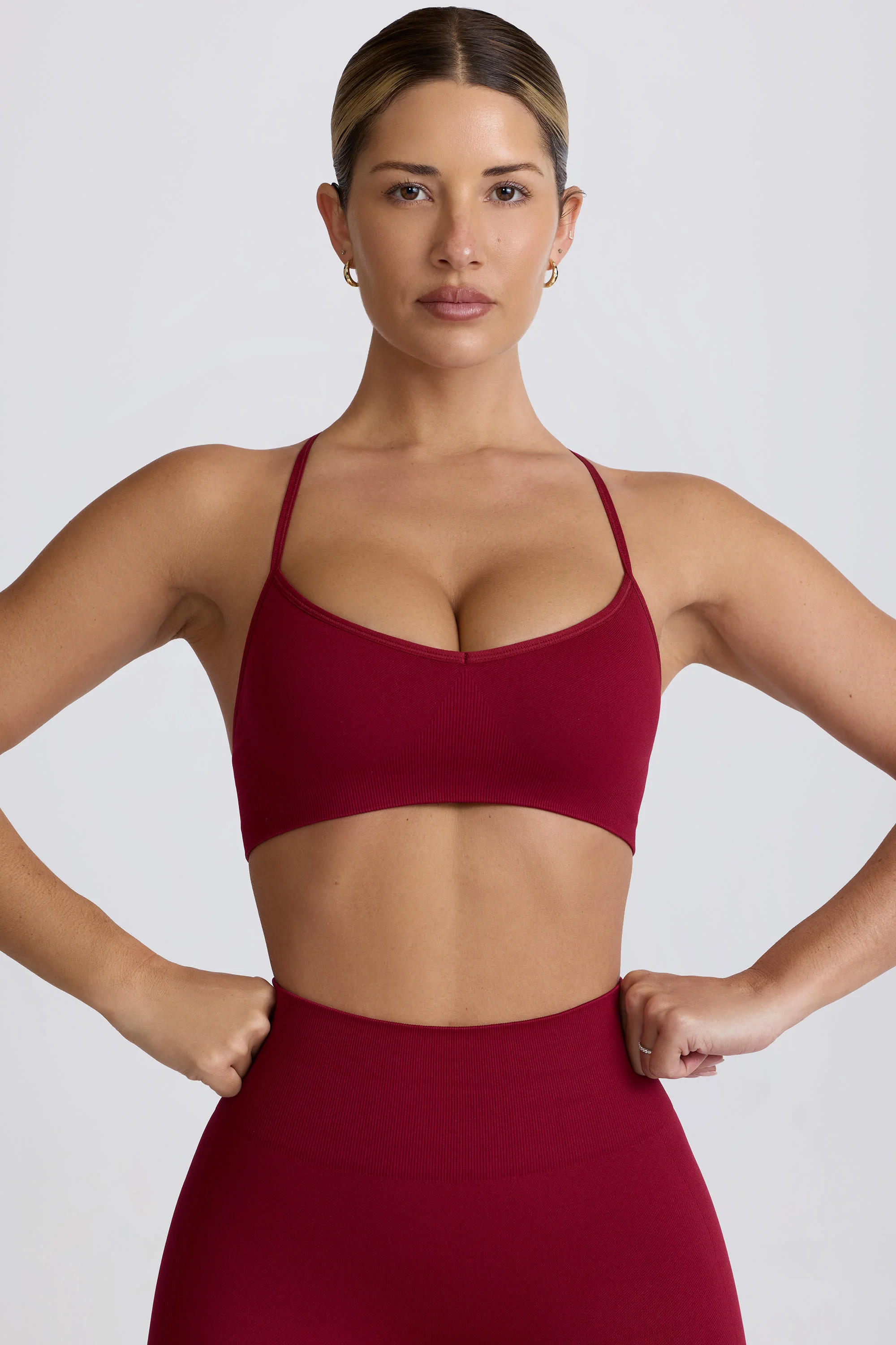 Super Sculpt Seamless Cross-Back Sports Bra in Burgundy - Image 7